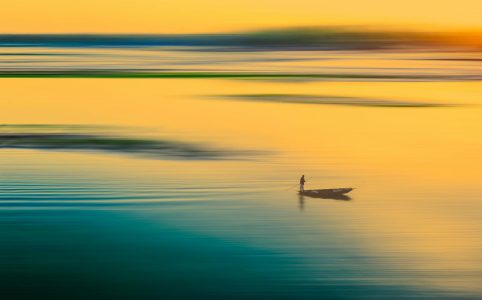 fisherman on a boat in the sea