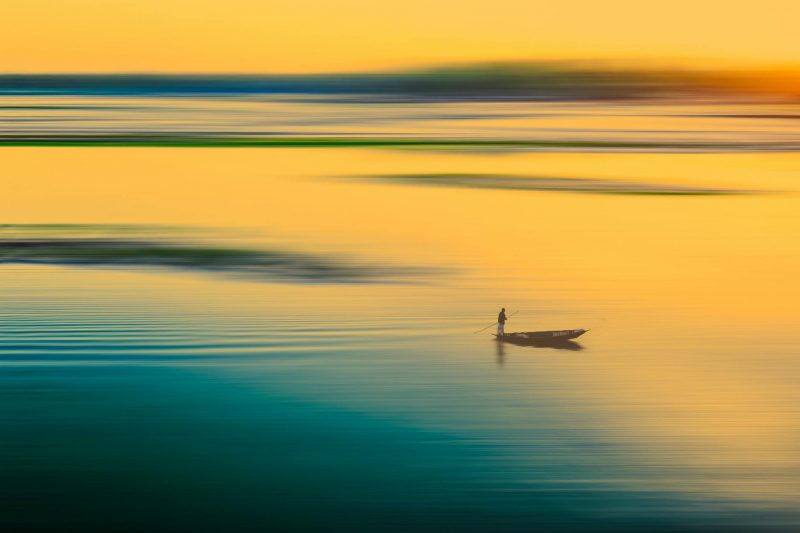 fisherman on a boat in the sea