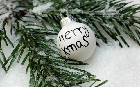 white bauble on christmas tree